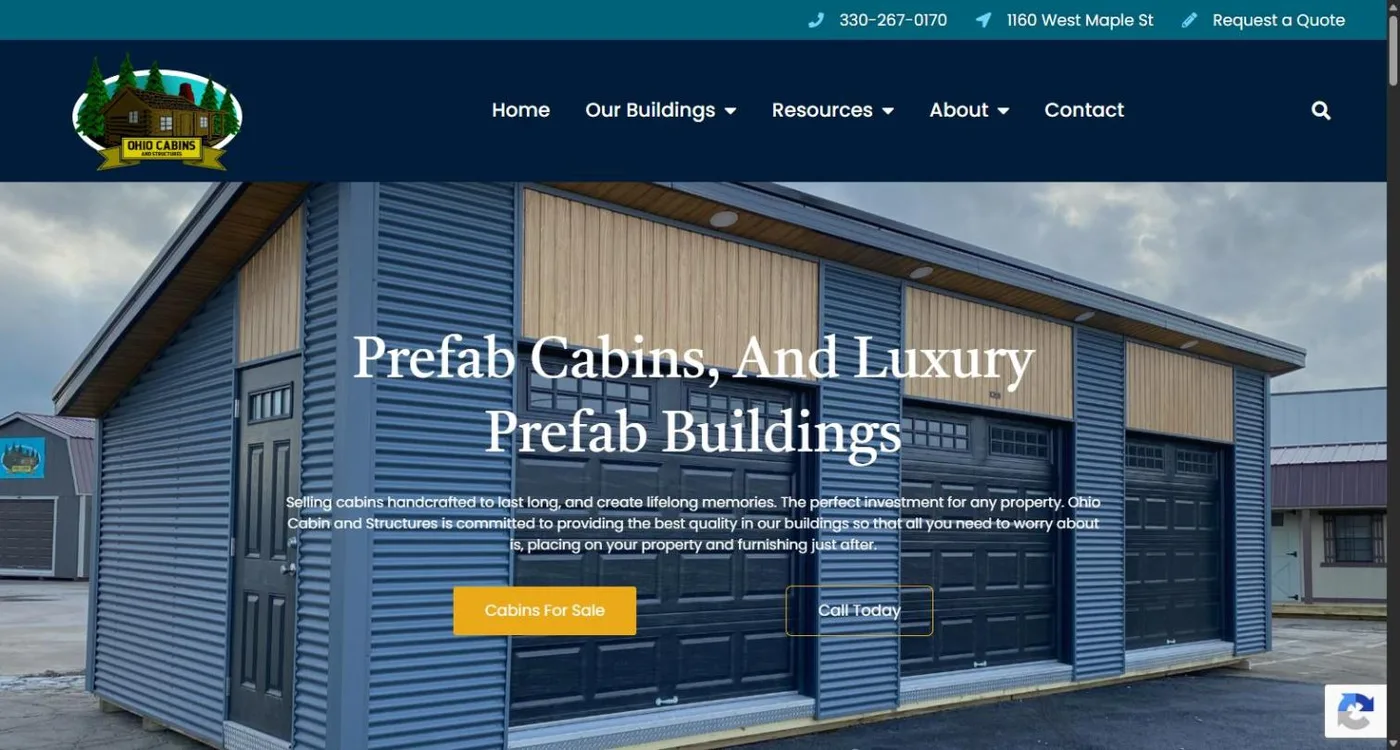 The Ohio Cabins and Structures homepage: the cabin logo in a navy header with phone, address and Request a Quote, over a full-width photo of a prefab garage with the headline Prefab Cabins, And Luxury Prefab Buildings and gold Cabins For Sale and Call Today buttons