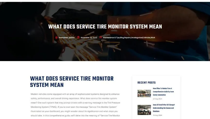 The What Does Service Tire Monitor System Mean article on Town Center Automotive: a dark hero photo of a mechanic grinding metal with sparks behind the bold title, and the article intro beside a Recent Posts sidebar